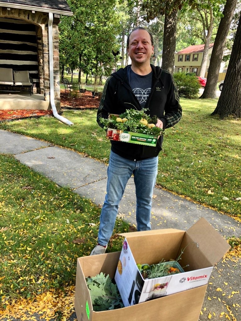 Kevin with veggie.JPG