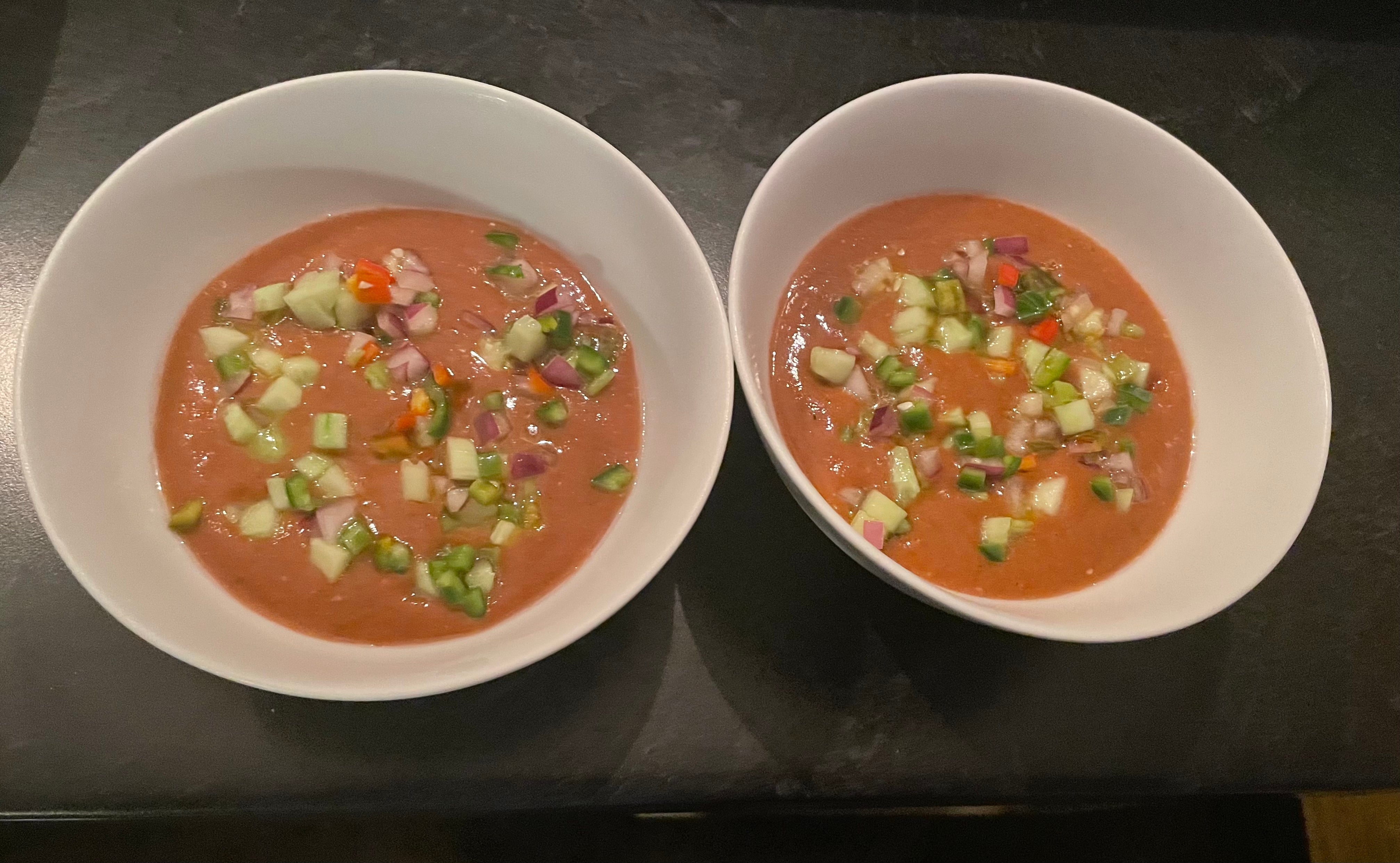 soup with chopped up veggies on top.jpeg